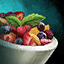 Bowl of Fruit Salad with Mint Garnish icon